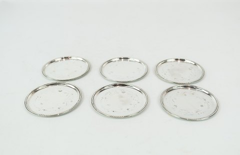 Set of glass trays in hallmarked silver. 
5000m2 showroom.
