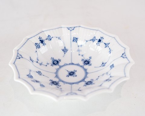 Blue fluted bowl, no.: 1/141 by Royal Copenhagen. 
5000m2 showroom.