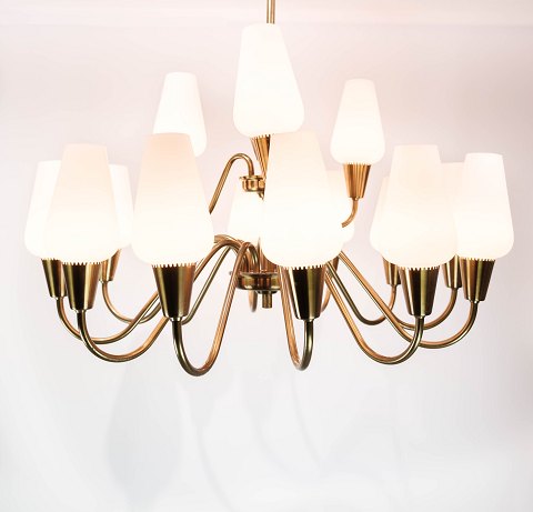 Lamp with arms of brass and glass, of Danish design from the 1950s.
