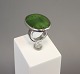 Silver ring  stamped 925s from From  with a large oval green Aventurine. 5000 m2showroom.