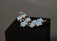 Simpel flower brooch in blue enamel and in gilded 925 sterling silver.
5000m2 showroom.
