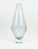 Glass vase in ice blue color by Holmegaard.
5000m2 udstilling.
