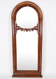 Tall mirror of mahogany and in great antique condition from the 1880s. 
