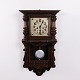 Antike Wanduhr aus Eiche mit Schnitzereien aus den 1920er Jahren